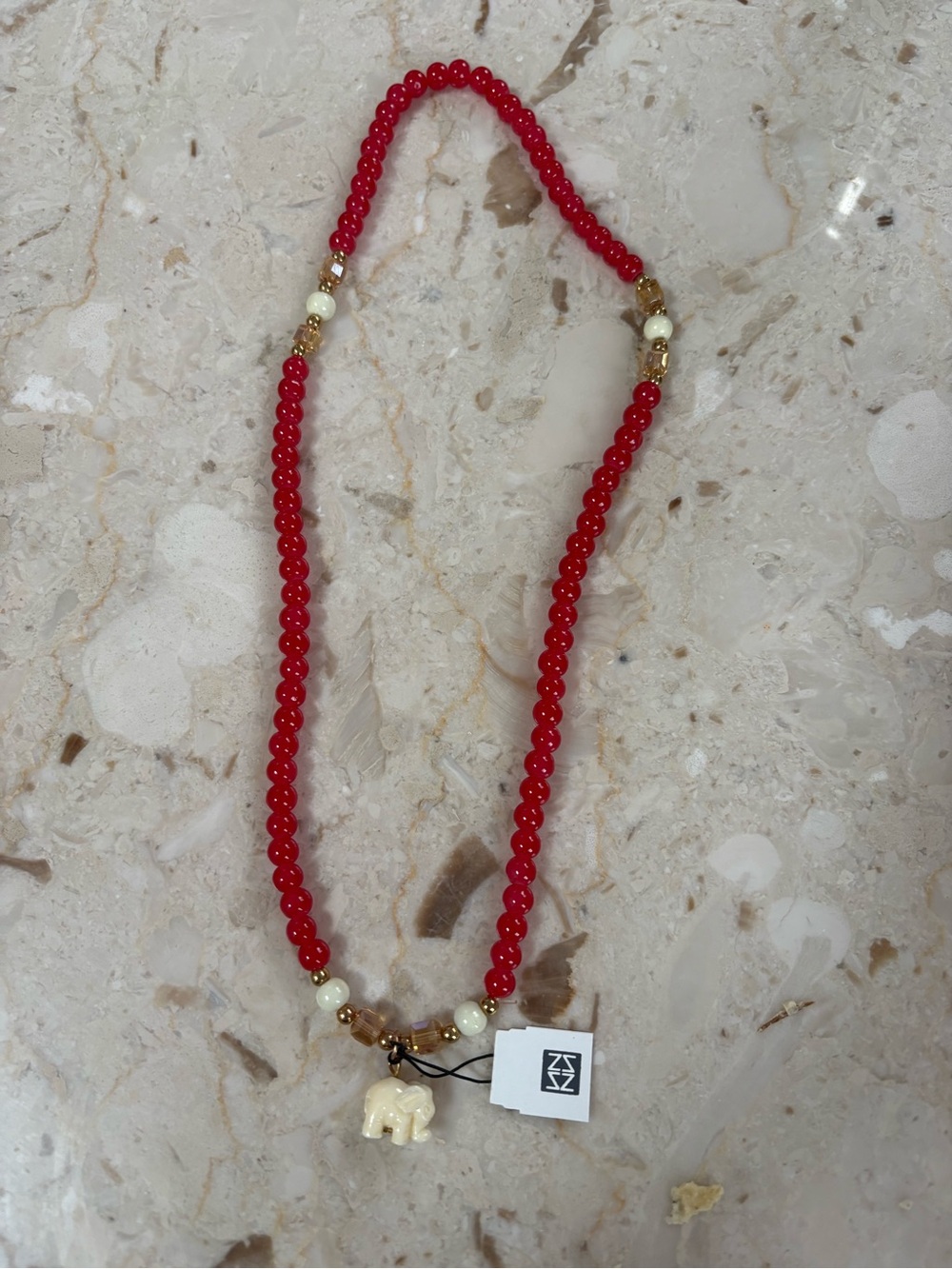 Red Beaded Necklace with Ivory Elephant Charm